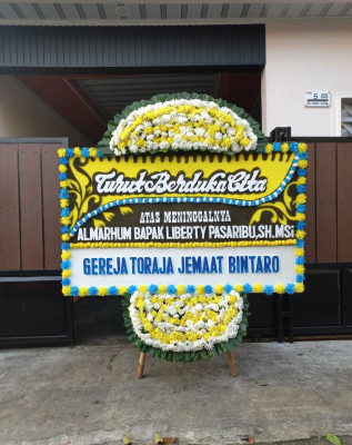 Papan Bunga Duka di Leihitu Barat